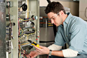 technician-working-on-furnace