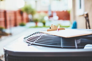 outside-ac-unit-with-paperwork-on-top